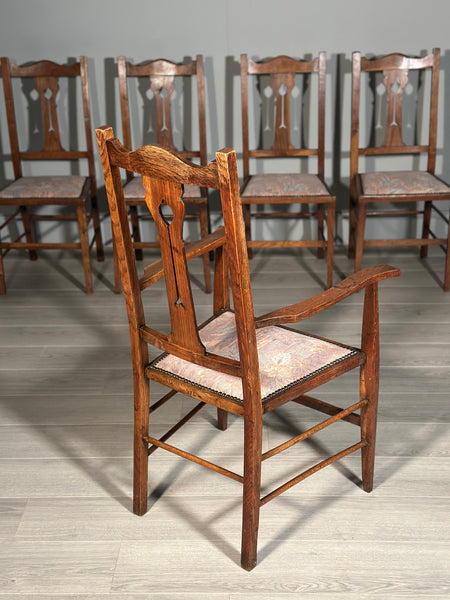 A Set Of Six Pure Arts And Crafts Oak Dining Chairs