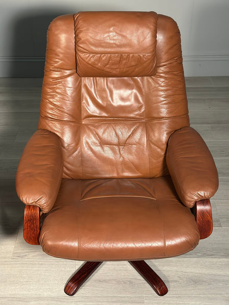 A Pair Of Daneway Swivel Recliner Armchairs And Stool