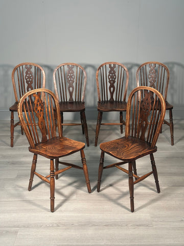 A Set of 6 19th Century Wheelback Dining Chairs
