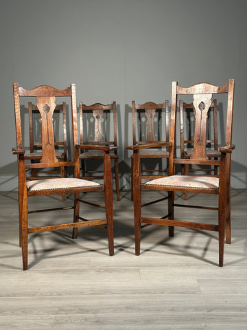 A Set Of Six Pure Arts And Crafts Oak Dining Chairs