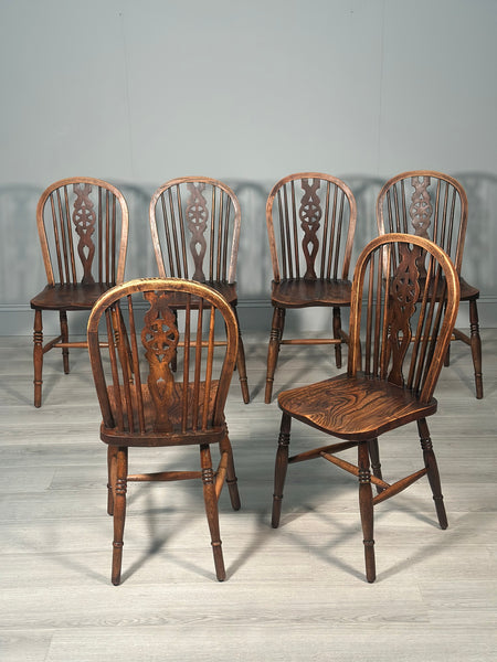 A Set of 6 19th Century Wheelback Dining Chairs