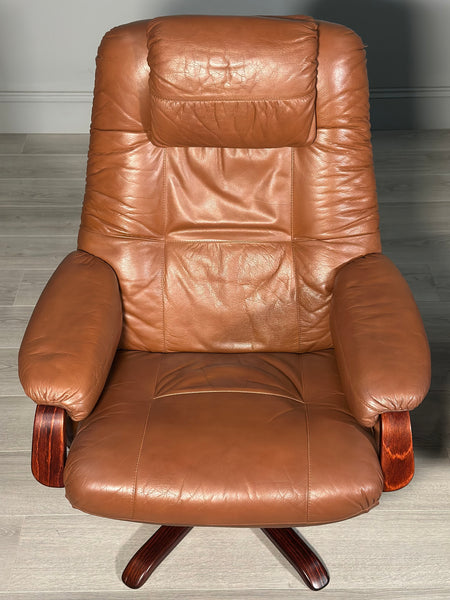 A Pair Of Daneway Swivel Recliner Armchairs And Stool