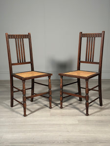 A Pair of Oak Chairs By Waring & Gillow