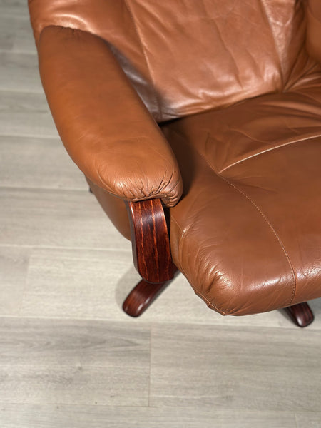 A Pair Of Daneway Swivel Recliner Armchairs And Stool