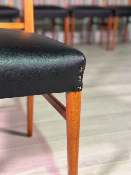 A Set Of 8 Gordon Russell Teak Dining Chairs