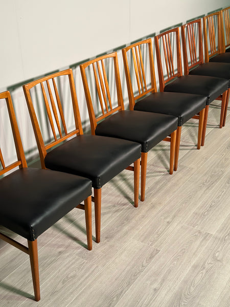 A Set Of 8 Gordon Russell Teak Dining Chairs