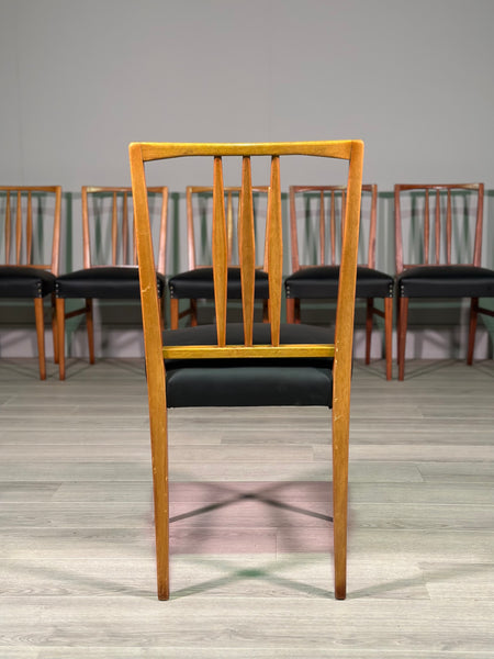 A Set Of 8 Gordon Russell Teak Dining Chairs