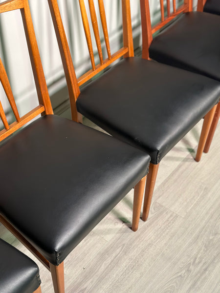 A Set Of 8 Gordon Russell Teak Dining Chairs