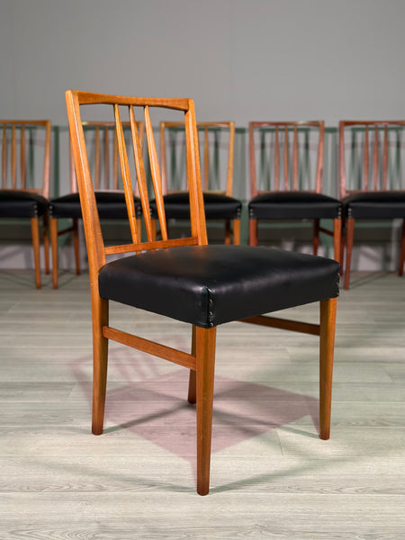 A Set Of 8 Gordon Russell Teak Dining Chairs