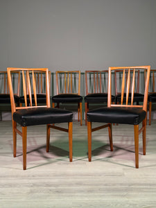 A Set Of 8 Gordon Russell Teak Dining Chairs